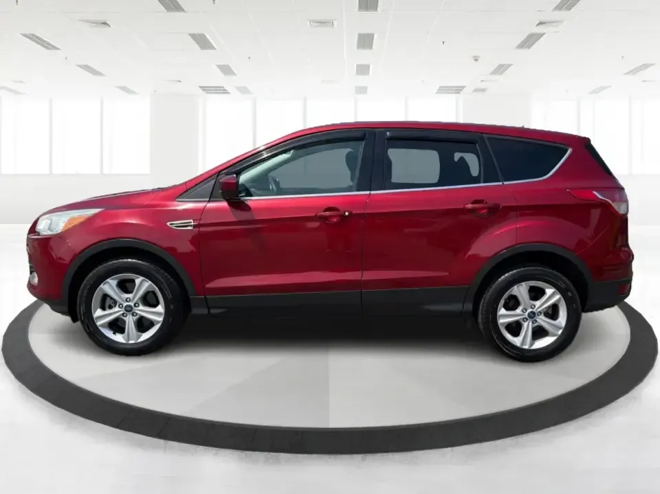 2014 Ford Escape SE (1FMCU9G9XEU) with an 2.0L L4 DOHC 16V engine, 6-Speed Automatic transmission, located at 4508 South Dixie Dr, Moraine, OH, 45439, (937) 908-9800, 39.689976, -84.218452 - Picture your next Ohio weekend: the kids loaded up for a day at Carillon Historical Park, a cooler in back for a picnic at Cox Arboretum, or a quick escape down I75 for a last-minute road trip-without worrying about whether your SUV can handle rain, slush, or a fully packed cargo area. This 2014 For - Photo#5