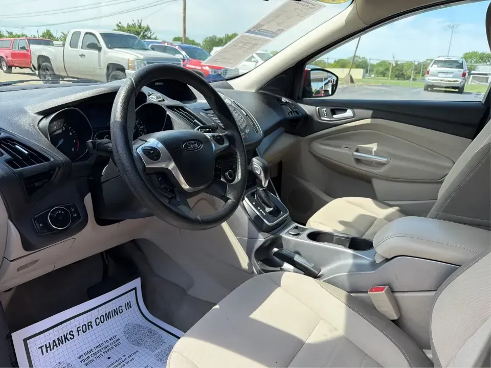 2014 Ford Escape SE (1FMCU9G9XEU) with an 2.0L L4 DOHC 16V engine, 6-Speed Automatic transmission, located at 4508 South Dixie Dr, Moraine, OH, 45439, (937) 908-9800, 39.689976, -84.218452 - Picture your next Ohio weekend: the kids loaded up for a day at Carillon Historical Park, a cooler in back for a picnic at Cox Arboretum, or a quick escape down I75 for a last-minute road trip-without worrying about whether your SUV can handle rain, slush, or a fully packed cargo area. This 2014 For - Photo#9