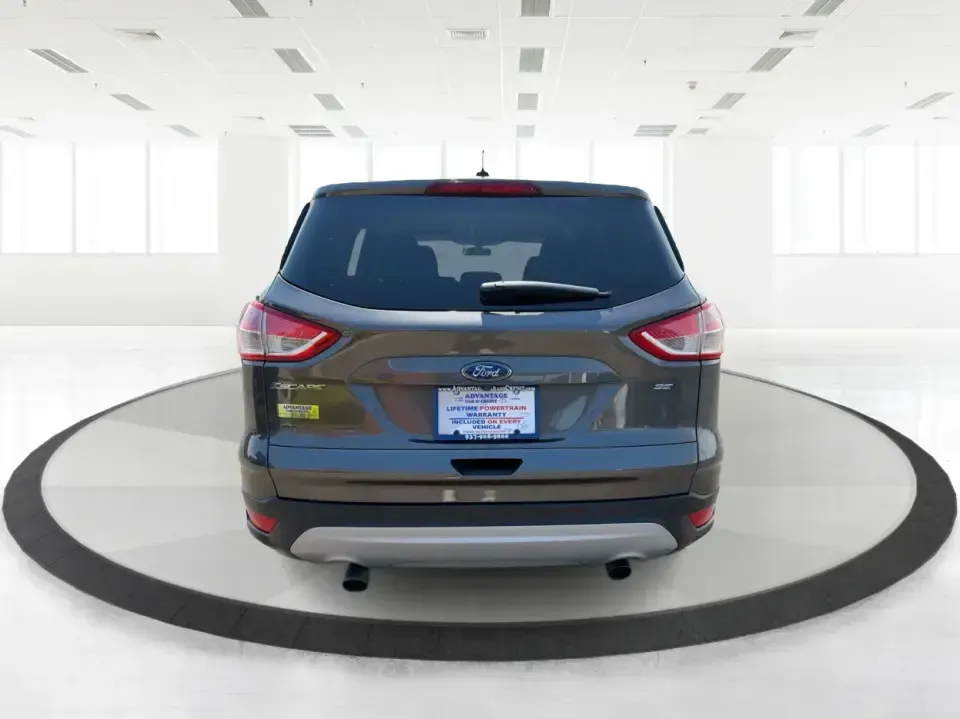 2016 Ford Escape SE (1FMCU0G77GU) with an 2.5L L4 DOHC 16V engine, 6-Speed Automatic transmission, located at 4508 South Dixie Dr, Moraine, OH, 45439, (937) 908-9800, 39.689976, -84.218452 - Whether you're commuting up and down South Dixie Drive, running errands between Moraine and Dayton, or packing up for a weekend getaway, this 2016 Ford Escape SE is the kind of practical SUV that fits real life. It's easy to park, comfortable for daily driving, and versatile enough for everything fr - Photo#3