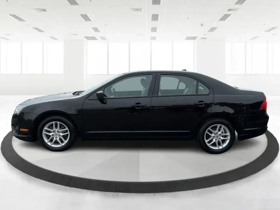 2012 Ford Fusion S (3FAHP0GA3CR) with an 2.5L I-4 DOHC engine, located at 1099 N County Rd 25A , Troy, OH, 45373, (937) 908-9800, 40.057079, -84.212883 - Need a dependable, budget-friendly sedan that can handle the weekday grind and still feel comfortable for weekend errands or a quick road trip to Dayton? This 2012 Ford Fusion S in sleek Tuxedo Black is a smart pick for commuters, first-time buyers, and growing families who want practical transporta - Photo#5
