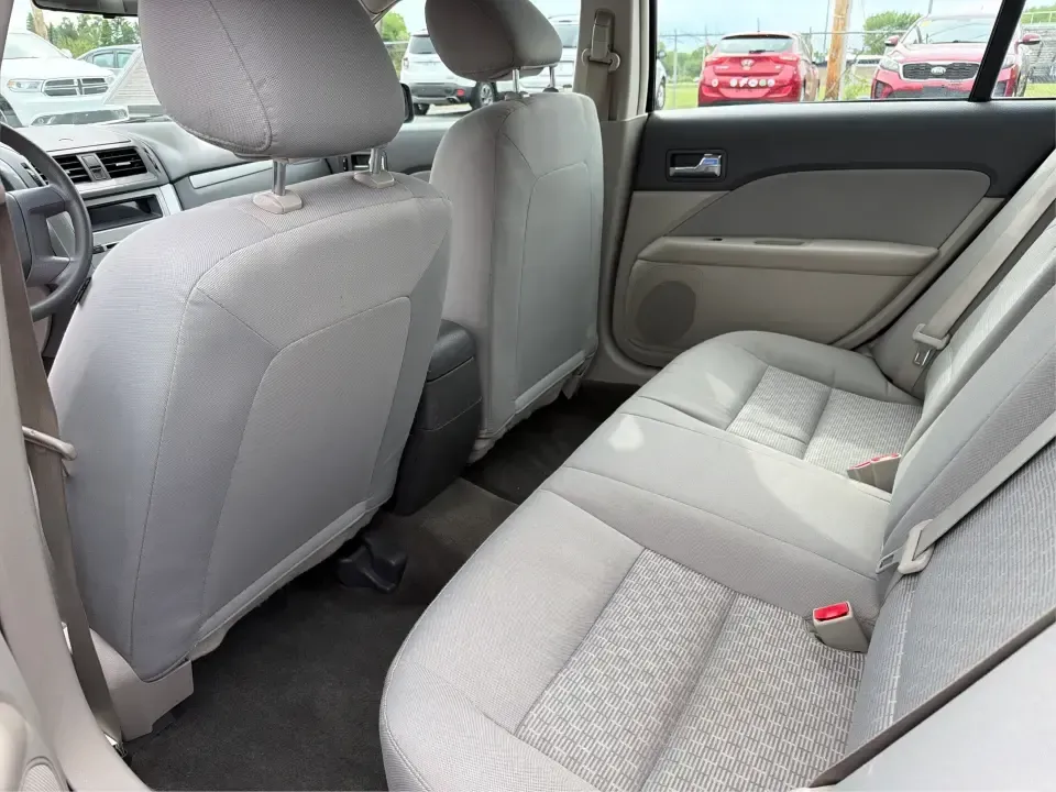 2012 Ford Fusion S (3FAHP0GA3CR) with an 2.5L I-4 DOHC engine, located at 1099 N County Rd 25A , Troy, OH, 45373, (937) 908-9800, 40.057079, -84.212883 - Need a dependable, budget-friendly sedan that can handle the weekday grind and still feel comfortable for weekend errands or a quick road trip to Dayton? This 2012 Ford Fusion S in sleek Tuxedo Black is a smart pick for commuters, first-time buyers, and growing families who want practical transporta - Photo#10