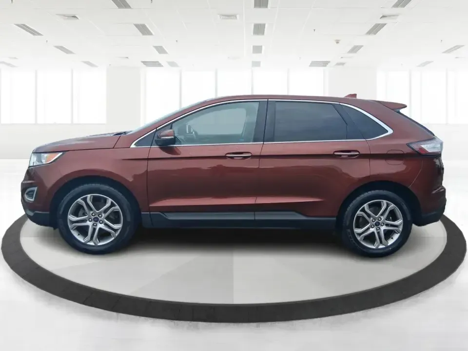 2016 Ford Edge Titanium (2FMPK3K91GB) with an 2.0L L4 DOHC 16V engine, 6A transmission, located at 4508 South Dixie Dr, Moraine, OH, 45439, (937) 908-9800, 39.689976, -84.218452 - Picture your next Ohio weekend: loading up groceries for the week in Moraine, grabbing coffee off South Dixie Drive, then cruising I-75 toward Dayton's Riverscape MetroPark or a quick family road trip to Carillon Historical Park-without feeling cramped, stressed, or under-equipped. This **2016 Ford - Photo#5