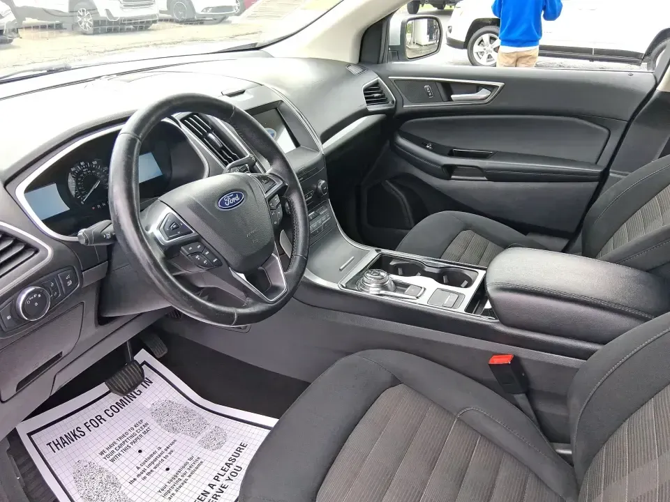 2019 Ford Edge SEL (2FMPK4J98KB) with an EcoBoost 2L I-4 gasoline direct injection engine, 6A transmission, located at 8750 N County Rd 25A, Piqua, OH, 45356, (937) 908-9800, 40.164391, -84.232513 - Picture your next road trip up I75, a week of school drop-offs, or a snowy Ohio commute that still feels calm and comfortable-this 2019 Ford Edge SEL AWD is built for real life. With confident all-wheel drive and a practical SUV layout, it's a smart fit for growing families, busy professionals, and - Photo#9