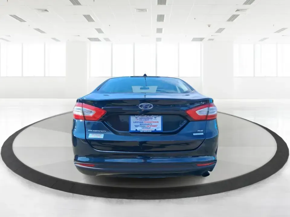 2014 Ford Fusion SE (3FA6P0HD8ER) with an 1.5L L4 DOHC 16V engine, located at 1099 N County Rd 25A , Troy, OH, 45373, (937) 908-9800, 40.057079, -84.212883 - Need a dependable commuter that still feels comfortable for date night in Beavercreek, errands around Xenia Station, and weekend drives out toward Caesars Creek? This 2014 Ford Fusion SE is the kind of smart, budget-friendly sedan that fits real life-easy to park downtown, smooth on longer stretches - Photo#3