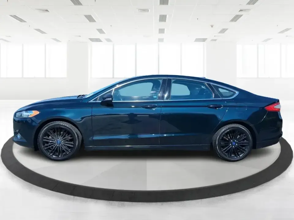 2014 Ford Fusion SE (3FA6P0HD8ER) with an 1.5L L4 DOHC 16V engine, located at 1099 N County Rd 25A , Troy, OH, 45373, (937) 908-9800, 40.057079, -84.212883 - Need a dependable commuter that still feels comfortable for date night in Beavercreek, errands around Xenia Station, and weekend drives out toward Caesars Creek? This 2014 Ford Fusion SE is the kind of smart, budget-friendly sedan that fits real life-easy to park downtown, smooth on longer stretches - Photo#5