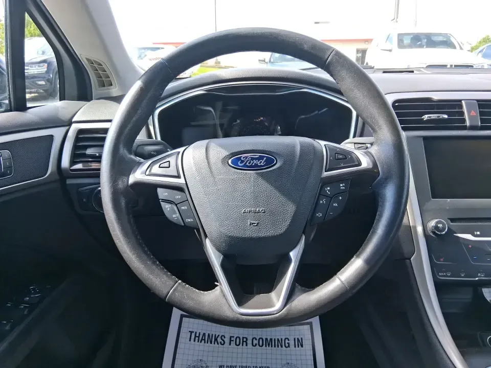 2014 Ford Fusion SE (3FA6P0HD8ER) with an 1.5L L4 DOHC 16V engine, located at 1099 N County Rd 25A , Troy, OH, 45373, (937) 908-9800, 40.057079, -84.212883 - Need a dependable commuter that still feels comfortable for date night in Beavercreek, errands around Xenia Station, and weekend drives out toward Caesars Creek? This 2014 Ford Fusion SE is the kind of smart, budget-friendly sedan that fits real life-easy to park downtown, smooth on longer stretches - Photo#16