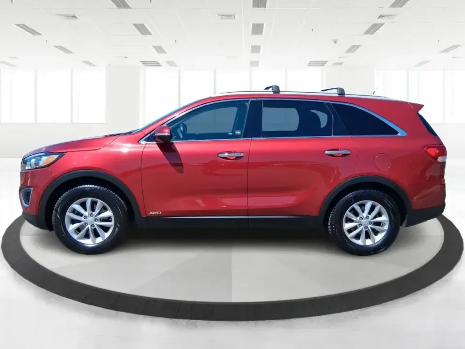 2017 Kia Sorento 2.4L LX (5XYPGDA37HG) with an 2.4L I-4 gasoline direct injection engine, 6A transmission, located at 8750 N County Rd 25A, Piqua, OH, 45356, (937) 908-9800, 40.164391, -84.232513 - Picture your next road trip out of Vandalia with room for the whole crew, the gear, and the groceries-without giving up everyday comfort. This **2017 Kia Sorento LX (2.4L)** in eye-catching **Remington Red** is the kind of SUV that fits real life: school drop-offs, long commutes to Dayton, weekend r - Photo#5