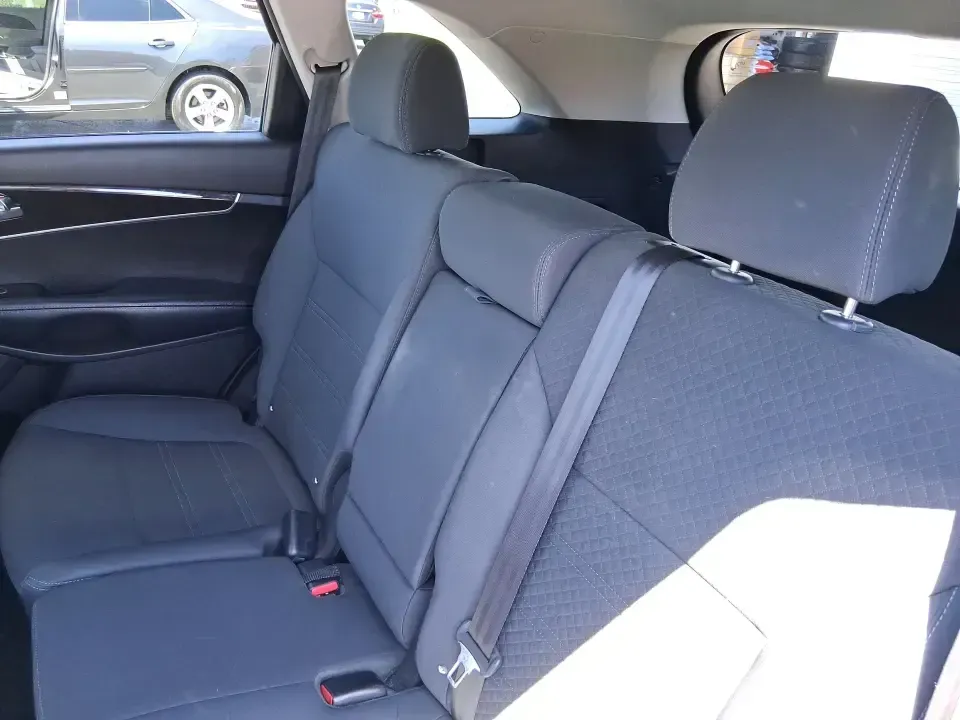 2017 Kia Sorento 2.4L LX (5XYPGDA37HG) with an 2.4L I-4 gasoline direct injection engine, 6A transmission, located at 8750 N County Rd 25A, Piqua, OH, 45356, (937) 908-9800, 40.164391, -84.232513 - Picture your next road trip out of Vandalia with room for the whole crew, the gear, and the groceries-without giving up everyday comfort. This **2017 Kia Sorento LX (2.4L)** in eye-catching **Remington Red** is the kind of SUV that fits real life: school drop-offs, long commutes to Dayton, weekend r - Photo#10