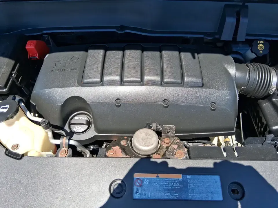 2013 Buick Enclave Premium (5GAKVDKDXDJ) with an 3.6L V-6 gasoline direct injection engine, 6-Speed Automatic Overdrive transmission, located at 880 E. National Road, Vandalia, OH, 45377, (937) 908-9800, 39.891918, -84.183594 - Pack up the kids, cue up a road-trip playlist, and head out with confidence-this 2013 Buick Enclave Premium is built for real life in and around Vandalia, whether you're doing school drop-offs, commuting to Dayton, or loading up for a weekend at Taylorsville MetroPark. With three-row versatility, up - Photo#11