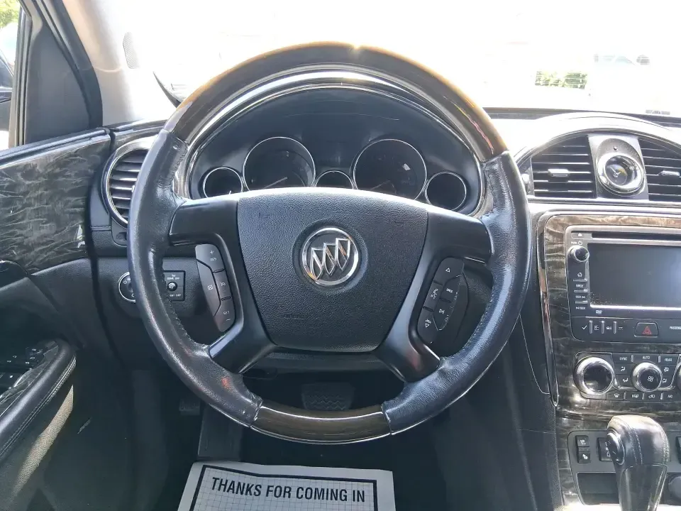 2013 Buick Enclave Premium (5GAKVDKDXDJ) with an 3.6L V-6 gasoline direct injection engine, 6-Speed Automatic Overdrive transmission, located at 880 E. National Road, Vandalia, OH, 45377, (937) 908-9800, 39.891918, -84.183594 - Pack up the kids, cue up a road-trip playlist, and head out with confidence-this 2013 Buick Enclave Premium is built for real life in and around Vandalia, whether you're doing school drop-offs, commuting to Dayton, or loading up for a weekend at Taylorsville MetroPark. With three-row versatility, up - Photo#16
