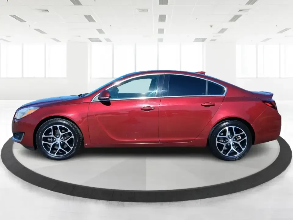 2017 Buick Regal Turbo Sport Touring (2G4GL5EX9H9) with an 2L I-4 gasoline direct injection engine, 6A transmission, located at 8750 N County Rd 25A, Piqua, OH, 45356, (937) 908-9800, 40.164391, -84.232513 - Need a sporty, comfortable commuter that still feels special on date night, errands around town, or a weekend run up I75? This 2017 Buick Regal Turbo Sport Touring in Crimson Red Tintcoat fits the lifestyle of drivers who want a refined sedan with confident power for daily miles, plus the kind of fe - Photo#5