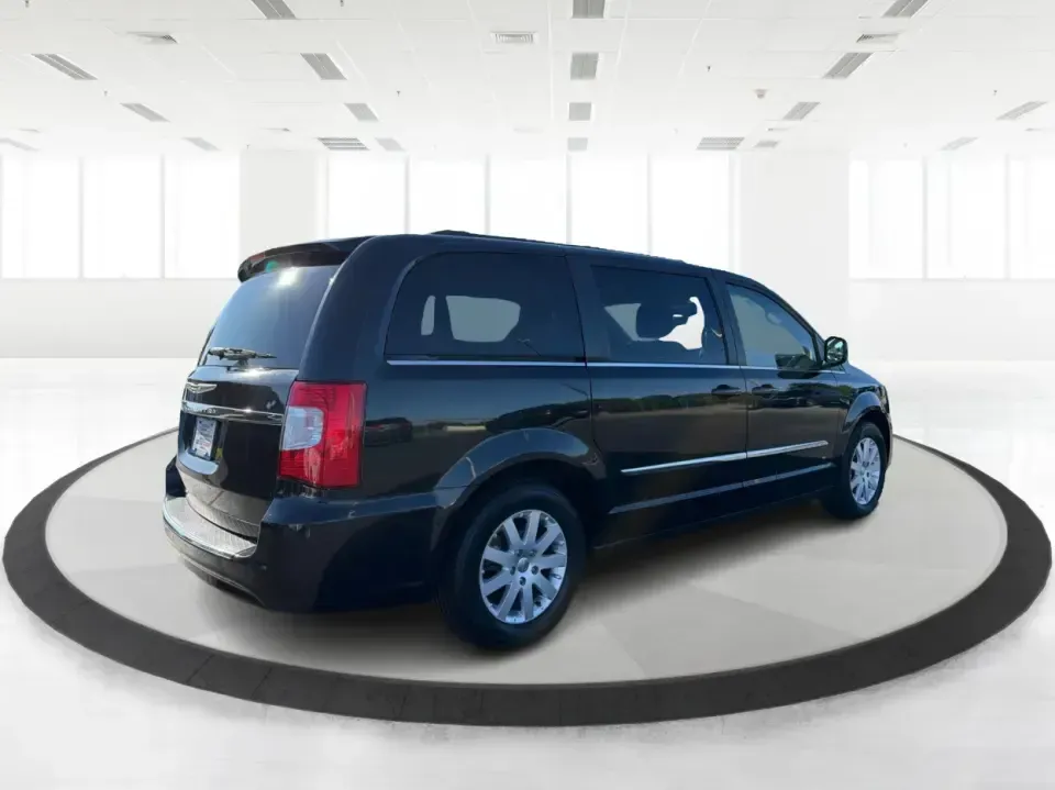 2013 Chrysler Town and Country Touring (2C4RC1BG8DR) with an Pentastar 3.6L V-6 DOHC engine, 6-Speed Automatic transmission, located at 8750 N County Rd 25A, Piqua, OH, 45356, (937) 908-9800, 40.164391, -84.232513 - Road-trip weekends, school drop-offs, and big-box store runs feel a lot easier when you've got a minivan that's built for real life. This 2013 Chrysler Town and Country Touring in Brilliant Black Crystal Pearlcoat is a smart pick for growing families, busy commuters, and budget-conscious buyers wh - Photo#2