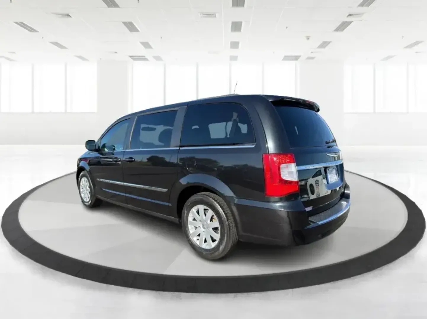 2013 Chrysler Town and Country Touring (2C4RC1BG8DR) with an Pentastar 3.6L V-6 DOHC engine, 6-Speed Automatic transmission, located at 8750 N County Rd 25A, Piqua, OH, 45356, (937) 908-9800, 40.164391, -84.232513 - Road-trip weekends, school drop-offs, and big-box store runs feel a lot easier when you've got a minivan that's built for real life. This 2013 Chrysler Town and Country Touring in Brilliant Black Crystal Pearlcoat is a smart pick for growing families, busy commuters, and budget-conscious buyers wh- Photo#4