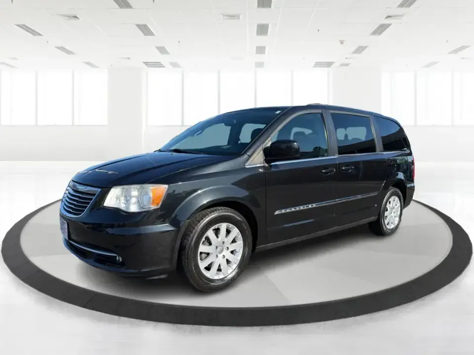2013 Chrysler Town and Country Touring (2C4RC1BG8DR) with an Pentastar 3.6L V-6 DOHC engine, 6-Speed Automatic transmission, located at 8750 N County Rd 25A, Piqua, OH, 45356, (937) 908-9800, 40.164391, -84.232513 - Road-trip weekends, school drop-offs, and big-box store runs feel a lot easier when you've got a minivan that's built for real life. This 2013 Chrysler Town and Country Touring in Brilliant Black Crystal Pearlcoat is a smart pick for growing families, busy commuters, and budget-conscious buyers wh - Photo#8