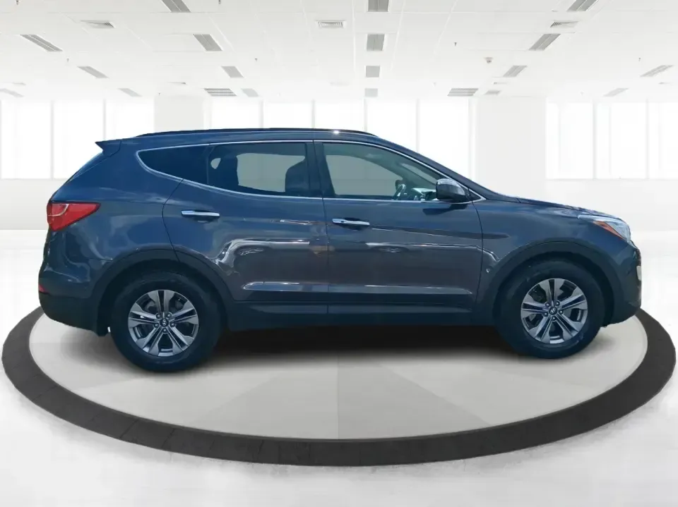 2015 Hyundai Santa Fe 2.4L (5XYZUDLB3FG) with an Theta II 2.4L I-4 gasoline direct injection engine, 6-Speed Automatic transmission, located at 401 Woodman Dr, Riverside, OH, 45431, (937) 908-9800, 39.760899, -84.123421 - Pack up the kids, load the cooler, and point your weekend plans toward the open road-this 2015 Hyundai Santa Fe 2.4L in Platinum Graphite is the kind of SUV that fits real life in Riverside. Whether you're commuting down I-75, running errands along Woodman Dr, or heading out for a day at Eastwood Me - Photo#1