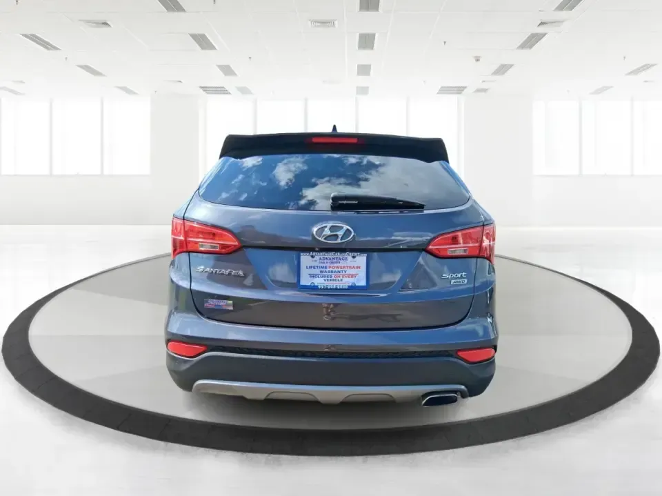 2015 Hyundai Santa Fe 2.4L (5XYZUDLB3FG) with an Theta II 2.4L I-4 gasoline direct injection engine, 6-Speed Automatic transmission, located at 401 Woodman Dr, Riverside, OH, 45431, (937) 908-9800, 39.760899, -84.123421 - Pack up the kids, load the cooler, and point your weekend plans toward the open road-this 2015 Hyundai Santa Fe 2.4L in Platinum Graphite is the kind of SUV that fits real life in Riverside. Whether you're commuting down I-75, running errands along Woodman Dr, or heading out for a day at Eastwood Me - Photo#3