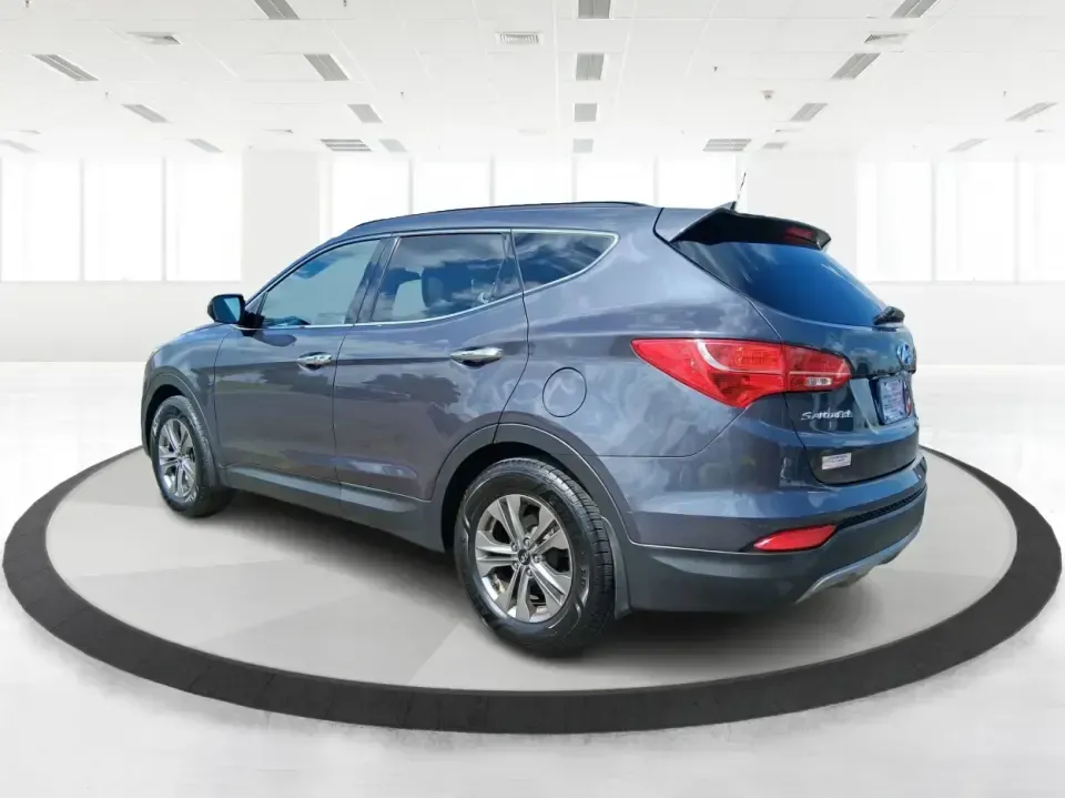 2015 Hyundai Santa Fe 2.4L (5XYZUDLB3FG) with an Theta II 2.4L I-4 gasoline direct injection engine, 6-Speed Automatic transmission, located at 401 Woodman Dr, Riverside, OH, 45431, (937) 908-9800, 39.760899, -84.123421 - Pack up the kids, load the cooler, and point your weekend plans toward the open road-this 2015 Hyundai Santa Fe 2.4L in Platinum Graphite is the kind of SUV that fits real life in Riverside. Whether you're commuting down I-75, running errands along Woodman Dr, or heading out for a day at Eastwood Me - Photo#4