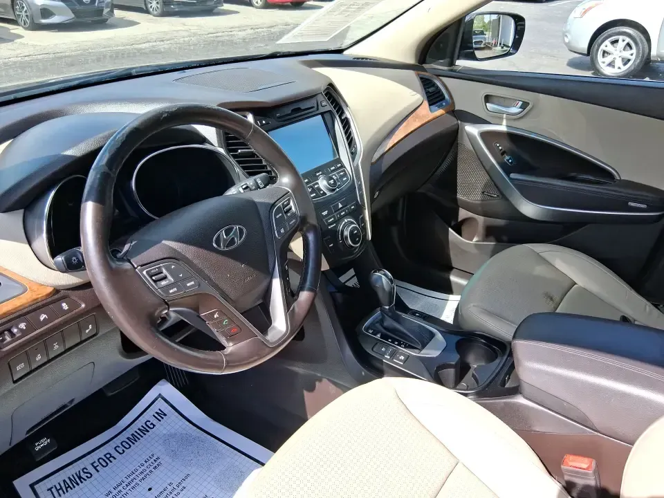 2015 Hyundai Santa Fe 2.4L (5XYZUDLB3FG) with an Theta II 2.4L I-4 gasoline direct injection engine, 6-Speed Automatic transmission, located at 401 Woodman Dr, Riverside, OH, 45431, (937) 908-9800, 39.760899, -84.123421 - Pack up the kids, load the cooler, and point your weekend plans toward the open road-this 2015 Hyundai Santa Fe 2.4L in Platinum Graphite is the kind of SUV that fits real life in Riverside. Whether you're commuting down I-75, running errands along Woodman Dr, or heading out for a day at Eastwood Me - Photo#9