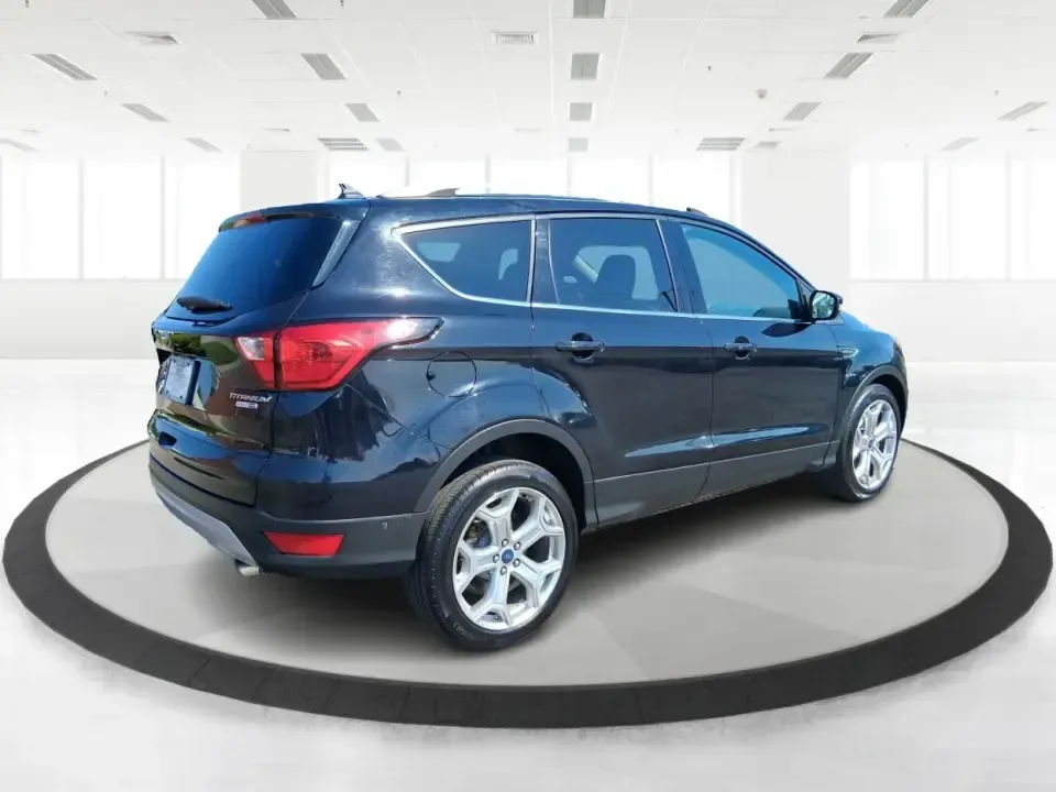 2019 Ford Escape Titanium (1FMCU9J9XKU) with an EcoBoost 2L I-4 gasoline direct injection engine, 6A transmission, located at 8750 N County Rd 25A, Piqua, OH, 45356, (937) 908-9800, 40.164391, -84.232513 - Pack up the kids, load the groceries, or point the hood toward a weekend getaway-this 2019 Ford Escape Titanium 4WD is built for real life in West Central Ohio, where commutes, school drop-offs, and quick trips up I75 all happen in the same week. With an upscale Titanium cabin and confident all-weat - Photo#2