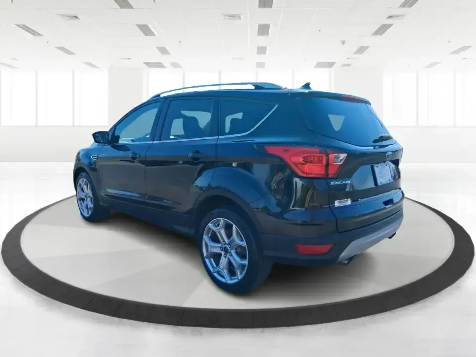2019 Ford Escape Titanium (1FMCU9J9XKU) with an EcoBoost 2L I-4 gasoline direct injection engine, 6A transmission, located at 8750 N County Rd 25A, Piqua, OH, 45356, (937) 908-9800, 40.164391, -84.232513 - Pack up the kids, load the groceries, or point the hood toward a weekend getaway-this 2019 Ford Escape Titanium 4WD is built for real life in West Central Ohio, where commutes, school drop-offs, and quick trips up I75 all happen in the same week. With an upscale Titanium cabin and confident all-weat - Photo#4