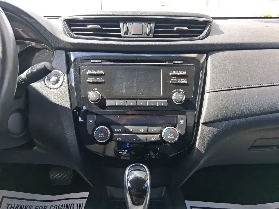 2017 Nissan Rogue SV (KNMAT2MV0HP) with an 2.5L I-4 DOHC engine, CVT transmission, located at 8750 N County Rd 25A, Piqua, OH, 45356, (937) 908-9800, 40.164391, -84.232513 - Picture your next road trip up I75 with the family, a weekend run to Indian Lake, or a confidence-inspiring commute through Miami County in a versatile SUV that's built to handle Ohio's changing seasons. This **2017 Nissan Rogue SV** in **Magnetic Black** brings the everyday practicality busy househ - Photo#13