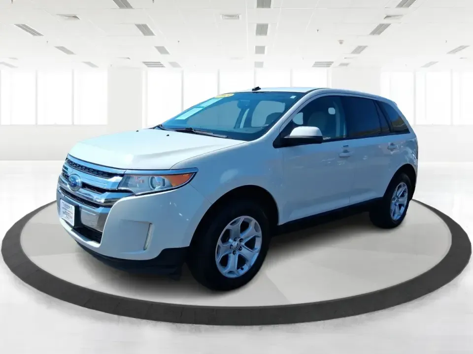 2013 Ford Edge SEL (2FMDK3JC2DB) with an 3.5L V6 DOHC 24V engine, 6-Speed Automatic transmission, located at 8750 N County Rd 25A, Piqua, OH, 45356, (937) 908-9800, 40.164391, -84.232513 - Picture your next road trip up I75 or a busy week of school dropoffs and commuting done in a roomy SUV that feels comfortable, confident, and ready for everyday Ohio life. This 2013 Ford Edge SEL is a smart fit for drivers who want midsize versatility without the bulky footprint-great for growing fa - Photo#8