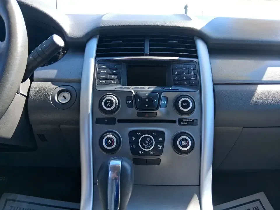 2013 Ford Edge SEL (2FMDK3JC2DB) with an 3.5L V6 DOHC 24V engine, 6-Speed Automatic transmission, located at 8750 N County Rd 25A, Piqua, OH, 45356, (937) 908-9800, 40.164391, -84.232513 - Picture your next road trip up I75 or a busy week of school dropoffs and commuting done in a roomy SUV that feels comfortable, confident, and ready for everyday Ohio life. This 2013 Ford Edge SEL is a smart fit for drivers who want midsize versatility without the bulky footprint-great for growing fa - Photo#13