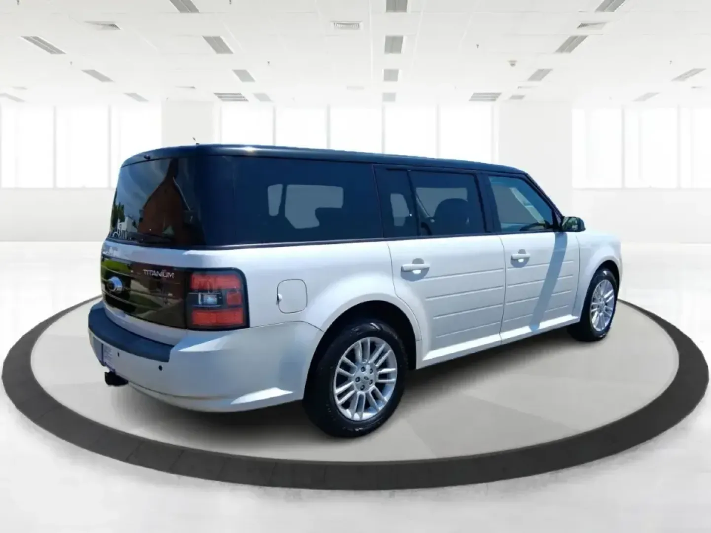 2011 Ford Flex Titanium (2FMGK5DC2BB) with an Duratec 3.5L V-6 DOHC engine, 6-Speed Automatic Overdrive transmission, located at 1951 S Dayton Lakeview Rd., New Carlisle, OH, 45344, (937) 908-9800, 39.890999, -84.050255 - Road-trip ready and family-friendly without feeling like a bus, this 2011 Ford Flex Limited | Titanium is the kind of crossover that fits real life-school drop-offs, long commutes, weekend tournaments, and those last-minute runs for groceries when the cargo space actually matters. Finished in White- Photo#2