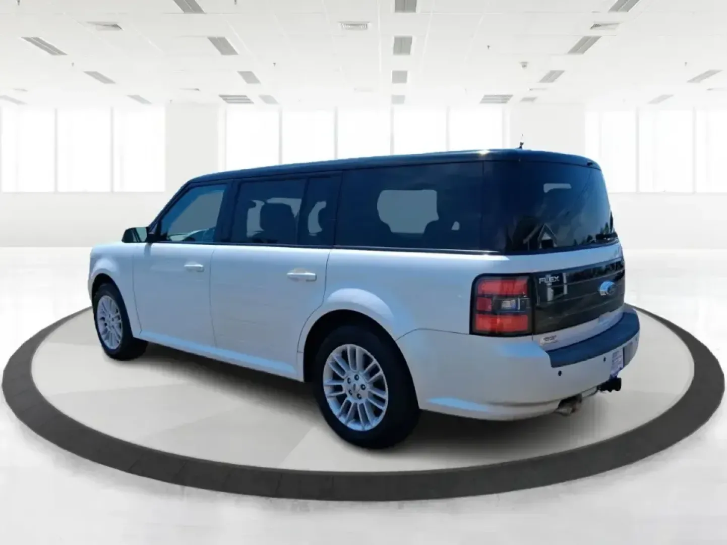 2011 Ford Flex Titanium (2FMGK5DC2BB) with an Duratec 3.5L V-6 DOHC engine, 6-Speed Automatic Overdrive transmission, located at 1951 S Dayton Lakeview Rd., New Carlisle, OH, 45344, (937) 908-9800, 39.890999, -84.050255 - Road-trip ready and family-friendly without feeling like a bus, this 2011 Ford Flex Limited | Titanium is the kind of crossover that fits real life-school drop-offs, long commutes, weekend tournaments, and those last-minute runs for groceries when the cargo space actually matters. Finished in White- Photo#4