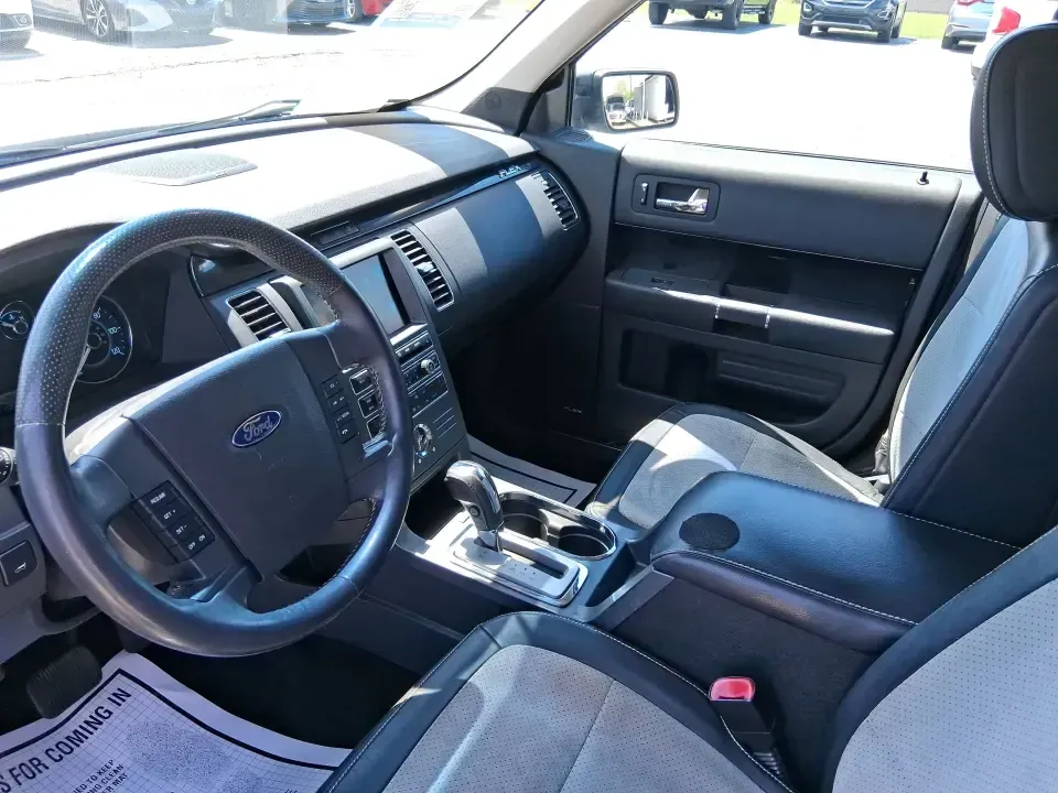 2011 Ford Flex Titanium (2FMGK5DC2BB) with an Duratec 3.5L V-6 DOHC engine, 6-Speed Automatic Overdrive transmission, located at 1951 S Dayton Lakeview Rd., New Carlisle, OH, 45344, (937) 908-9800, 39.890999, -84.050255 - Road-trip ready and family-friendly without feeling like a bus, this 2011 Ford Flex Limited | Titanium is the kind of crossover that fits real life-school drop-offs, long commutes, weekend tournaments, and those last-minute runs for groceries when the cargo space actually matters. Finished in White - Photo#9