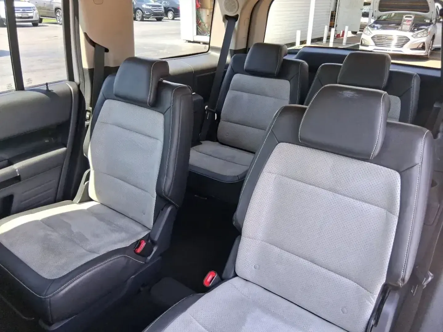 2011 Ford Flex Titanium (2FMGK5DC2BB) with an Duratec 3.5L V-6 DOHC engine, 6-Speed Automatic Overdrive transmission, located at 1951 S Dayton Lakeview Rd., New Carlisle, OH, 45344, (937) 908-9800, 39.890999, -84.050255 - Road-trip ready and family-friendly without feeling like a bus, this 2011 Ford Flex Limited | Titanium is the kind of crossover that fits real life-school drop-offs, long commutes, weekend tournaments, and those last-minute runs for groceries when the cargo space actually matters. Finished in White- Photo#10