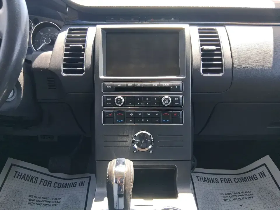 2011 Ford Flex Titanium (2FMGK5DC2BB) with an Duratec 3.5L V-6 DOHC engine, 6-Speed Automatic Overdrive transmission, located at 1951 S Dayton Lakeview Rd., New Carlisle, OH, 45344, (937) 908-9800, 39.890999, -84.050255 - Road-trip ready and family-friendly without feeling like a bus, this 2011 Ford Flex Limited | Titanium is the kind of crossover that fits real life-school drop-offs, long commutes, weekend tournaments, and those last-minute runs for groceries when the cargo space actually matters. Finished in White - Photo#13
