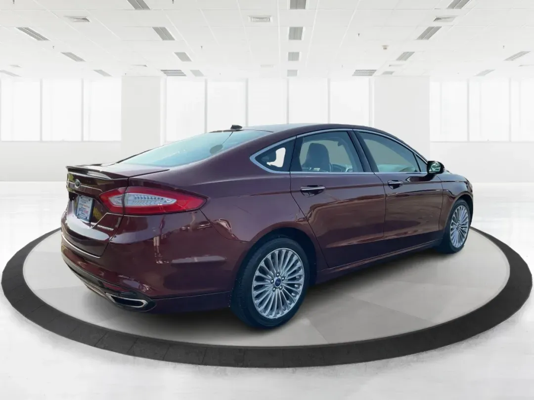 2016 Ford Fusion Titanium (3FA6P0K92GR) with an EcoBoost 2L I-4 gasoline direct injection engine, located at 1184 Kauffman Ave, Fairborn, OH, 45324, (937) 908-9800, 39.807072, -84.030914 - **Elevate Your Driving Experience with the 2016 Ford Fusion Titanium Where Style Meets Functionality!**<br /> <br /> Are you searching for the perfect blend of style, comfort, and advanced technology for your daily commute or weekend getaways? Look no further than the stunning 2016 Ford Fusion Tita - Photo#2