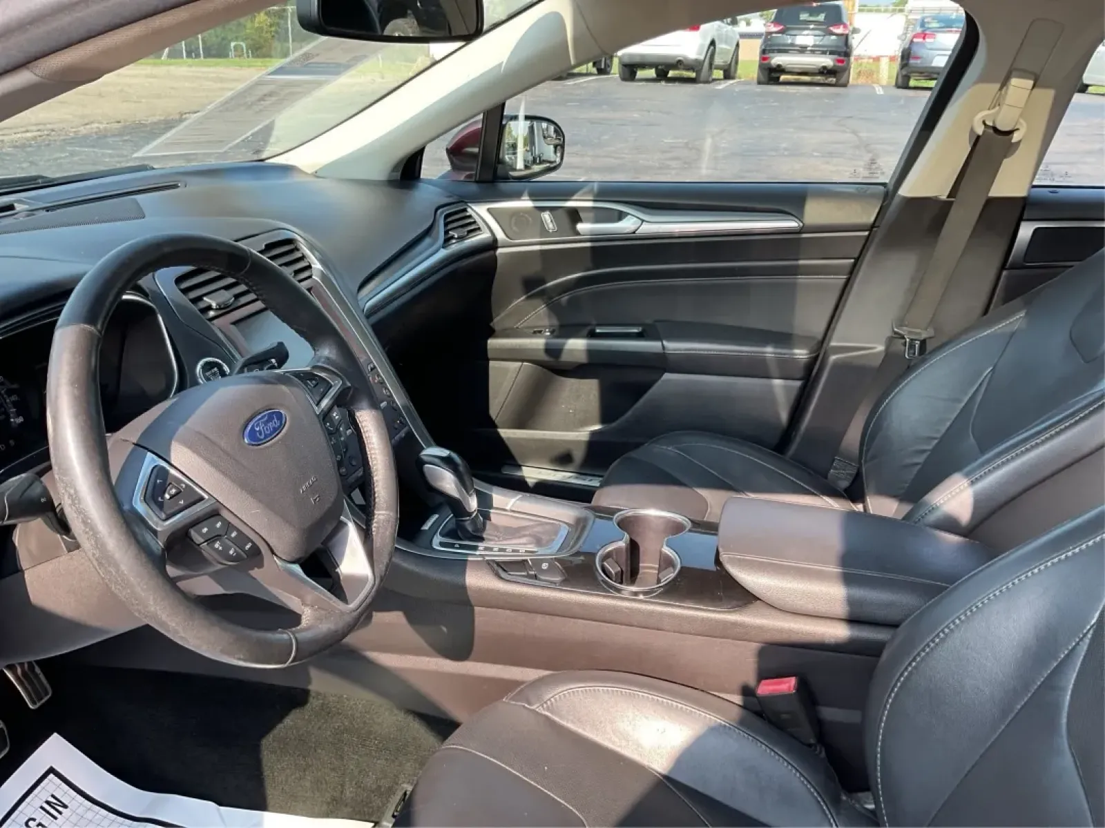 2016 Ford Fusion Titanium (3FA6P0K92GR) with an EcoBoost 2L I-4 gasoline direct injection engine, located at 1099 N County Rd 25A , Troy, OH, 45373, (937) 908-9800, 40.057079, -84.212883 - **Elevate Your Driving Experience with the 2016 Ford Fusion Titanium Where Style Meets Functionality!**<br /> <br /> Are you searching for the perfect blend of style, comfort, and advanced technology for your daily commute or weekend getaways? Look no further than the stunning 2016 Ford Fusion Tita - Photo#9