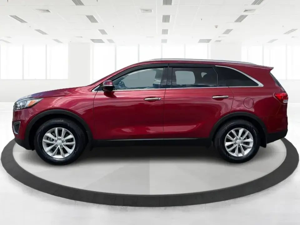 2016 Kia Sorento 2.4L LX (5XYPG4A38GG) with an 2.4L I-4 gasoline direct injection engine, 6-Speed Automatic transmission, located at 880 E. National Road, Vandalia, OH, 45377, (937) 908-9800, 39.891918, -84.183594 - Load up the family, point the hood toward I75, and make weekend plans feel easy again-this 2016 Kia Sorento LX is the kind of midsize SUV that fits real life in Vandalia, from school runs and grocery stops to road trips toward Dayton or a quick getaway out by the Great Miami River. Finished in stand - Photo#5