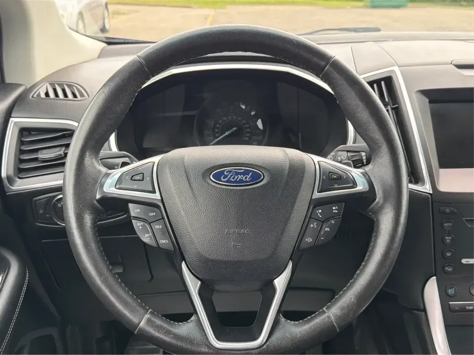 2015 Ford Edge Titanium (2FMTK4K82FB) with an 3.5L V6 DOHC 24V engine, 6-Speed Automatic transmission, located at 1184 Kauffman Ave, Fairborn, OH, 45324, (937) 908-9800, 39.807072, -84.030914 - Need a comfortable, confident SUV for Dayton-area commuting, school drop-offs, and spontaneous weekend getaways to Yellow Springs? This 2015 Ford Edge Titanium in Tuxedo Black Metallic blends everyday practicality with upscale features, giving you a road-trip-ready ride that fits a busy life in Fair - Photo#16