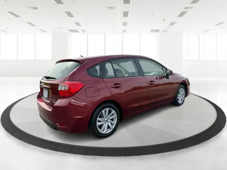 2016 Subaru Impreza 2.0i Premium (JF1GPAB6XG8) with an 2L H-4 DOHC engine, CVT transmission, located at 1099 N County Rd 25A , Troy, OH, 45373, (937) 908-9800, 40.057079, -84.212883 - Need a practical daily driver that can handle Ohio weather, tight parking lots, and spontaneous weekend getaways? This **2016 Subaru Impreza 2.0i Premium Hatchback** is built for commuters, students, and small families who want confident traction, smart cargo space, and a comfortable cabin-whether y - Photo#2