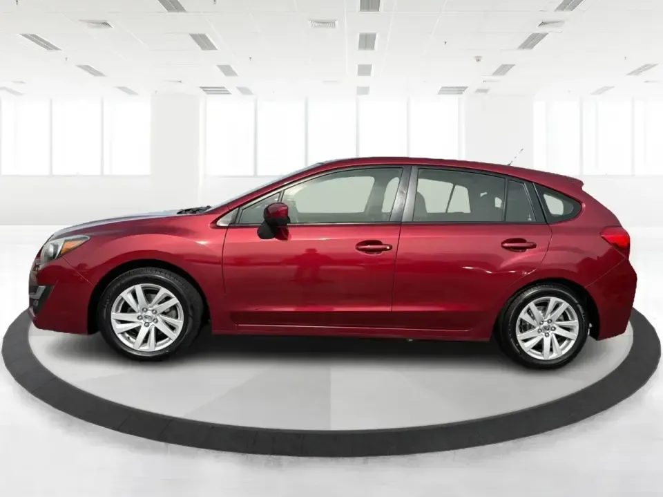 2016 Subaru Impreza 2.0i Premium (JF1GPAB6XG8) with an 2L H-4 DOHC engine, CVT transmission, located at 1099 N County Rd 25A , Troy, OH, 45373, (937) 908-9800, 40.057079, -84.212883 - Need a practical daily driver that can handle Ohio weather, tight parking lots, and spontaneous weekend getaways? This **2016 Subaru Impreza 2.0i Premium Hatchback** is built for commuters, students, and small families who want confident traction, smart cargo space, and a comfortable cabin-whether y - Photo#5