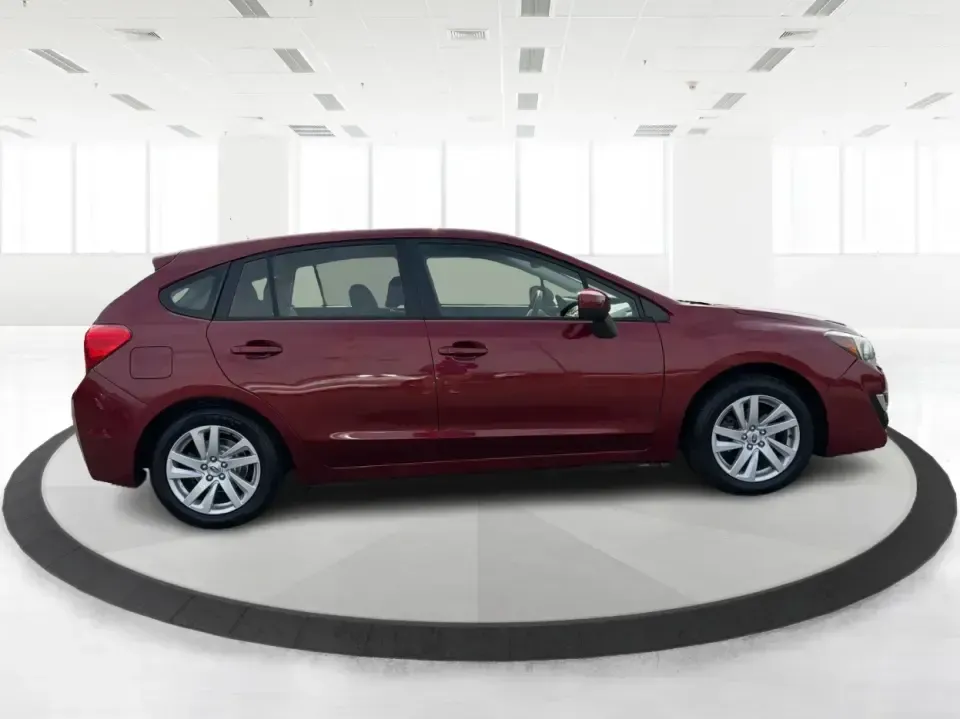 2016 Subaru Impreza 2.0i Premium (JF1GPAB6XG8) with an 2L H-4 DOHC engine, CVT transmission, located at 401 Woodman Dr, Riverside, OH, 45431, (937) 908-9800, 39.760899, -84.123421 - Need a practical daily driver that can handle Ohio weather, tight parking lots, and spontaneous weekend getaways? This **2016 Subaru Impreza 2.0i Premium Hatchback** is built for commuters, students, and small families who want confident traction, smart cargo space, and a comfortable cabin-whether y - Photo#1