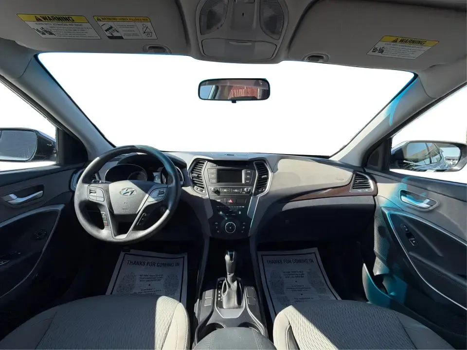 2017 Hyundai Santa Fe 2.4L (5XYZT3LB8HG) with an Theta II 2.4L I-4 gasoline direct injection engine, 6A transmission, located at 8750 N County Rd 25A, Piqua, OH, 45356, (937) 908-9800, 40.164391, -84.232513 - Load up the family, point the GPS toward a weekend getaway, and enjoy the confidence of an SUV that's built for everyday life in Ohio-this **2017 Hyundai Santa Fe 2.4L** is a smart pick for commuting, school runs, and road trips alike. Finished in **Sparkling Silver**, it brings the practical space - Photo#19