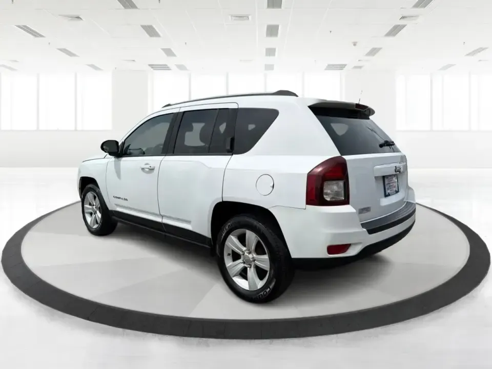 2016 Jeep Compass Sport (1C4NJCBA1GD) with an 2.0L L4 DOHC 16V engine, Automatic transmission, located at 4508 South Dixie Dr, Moraine, OH, 45439, (937) 908-9800, 39.689976, -84.218452 - **Adventure Awaits with the 2016 Jeep Compass Sport in Fairborn, OH!**<br /> <br /> Are you and your family ready to embark on thrilling weekend adventures or find the ideal companion for your daily commute? Look no further! The 2016 Jeep Compass Sport is the perfect SUV for those who need a dependa - Photo#4