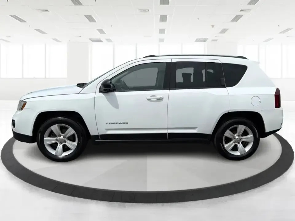 2016 Jeep Compass Sport (1C4NJCBA1GD) with an 2.0L L4 DOHC 16V engine, Automatic transmission, located at 4508 South Dixie Dr, Moraine, OH, 45439, (937) 908-9800, 39.689976, -84.218452 - **Adventure Awaits with the 2016 Jeep Compass Sport in Fairborn, OH!**<br /> <br /> Are you and your family ready to embark on thrilling weekend adventures or find the ideal companion for your daily commute? Look no further! The 2016 Jeep Compass Sport is the perfect SUV for those who need a dependa - Photo#5