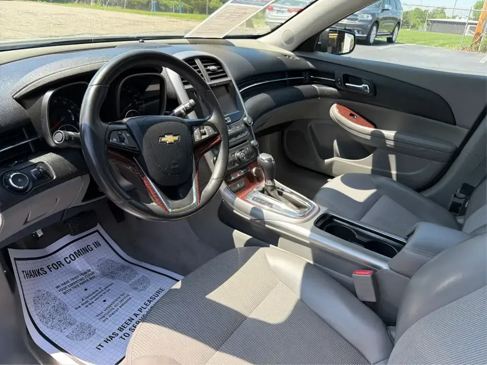 2013 Chevrolet Malibu 2LT (1G11E5SA0DF) with an ECOTEC 2.5L I-4 gasoline direct injection engine, 6-Speed Automatic transmission, located at 880 E. National Road, Vandalia, OH, 45377, (937) 908-9800, 39.891918, -84.183594 - Need a dependable sedan for the daily commute up I75, quick school drop-offs, and comfortable weekend drives to the Dayton Art Institute or a Dragons game? This 2013 Chevrolet Malibu 2LT in Black Granite Metallic fits the real-life routine of busy families, first-time buyers, and budget-conscious dr - Photo#9