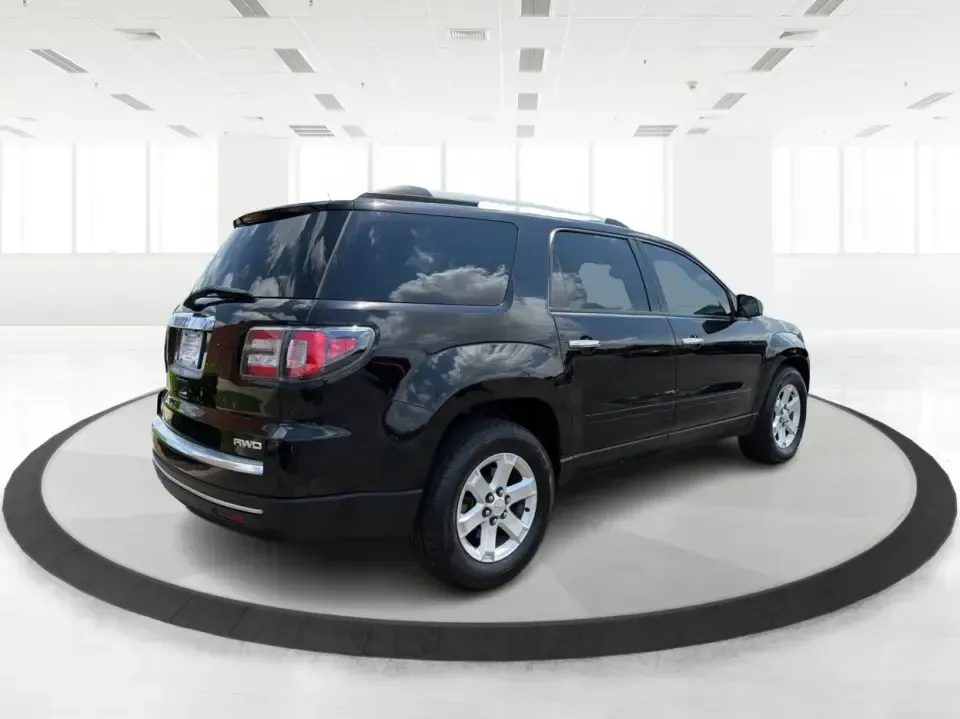 2016 GMC Acadia SLE-2 (1GKKVPKD1GJ) with an 3.6L V-6 gasoline direct injection engine, 6A transmission, located at 401 Woodman Dr, Riverside, OH, 45431, (937) 908-9800, 39.760899, -84.123421 - Need one SUV that can handle school drop-offs, long commutes, and weekend getaways to the MetroParks without feeling cramped? This 2016 GMC Acadia SLE-2 in Ebony Twilight Metallic is a smart fit for busy families and active drivers who want three-row flexibility, confident traction, and everyday com - Photo#2