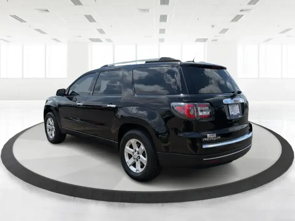 2016 GMC Acadia SLE-2 (1GKKVPKD1GJ) with an 3.6L V-6 gasoline direct injection engine, 6A transmission, located at 401 Woodman Dr, Riverside, OH, 45431, (937) 908-9800, 39.760899, -84.123421 - Need one SUV that can handle school drop-offs, long commutes, and weekend getaways to the MetroParks without feeling cramped? This 2016 GMC Acadia SLE-2 in Ebony Twilight Metallic is a smart fit for busy families and active drivers who want three-row flexibility, confident traction, and everyday com - Photo#4
