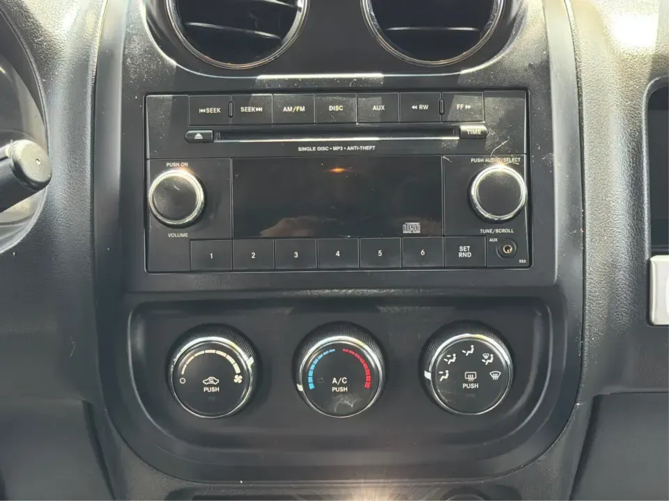 2015 Jeep Compass Sport (1C4NJDBB8FD) with an 2.4L I-4 DOHC engine, located at 401 Woodman Dr, Riverside, OH, 45431, (937) 908-9800, 39.760899, -84.123421 - Weekend plans don't always stay on pavement-and that's exactly where this 2015 Jeep Compass Sport shines. Whether you're mapping out a family day at Riverscape MetroPark, heading to Wright-Patterson AFB for work, or taking a quick escape to the trails and backroads outside Riverside, this compact SU - Photo#13