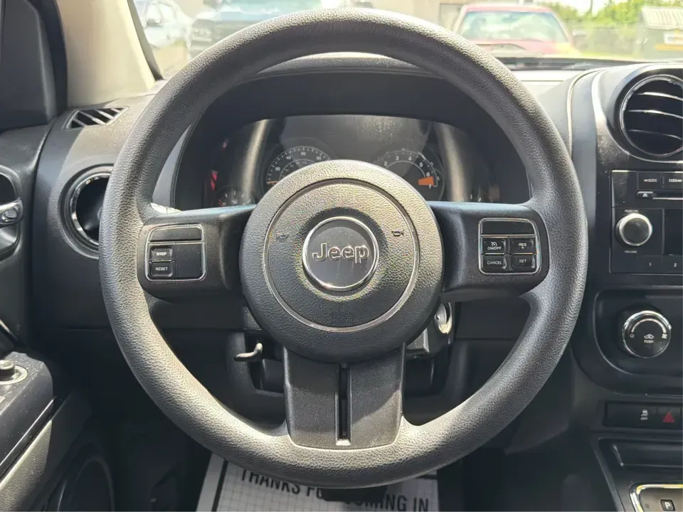 2015 Jeep Compass Sport (1C4NJDBB8FD) with an 2.4L I-4 DOHC engine, located at 401 Woodman Dr, Riverside, OH, 45431, (937) 908-9800, 39.760899, -84.123421 - Weekend plans don't always stay on pavement-and that's exactly where this 2015 Jeep Compass Sport shines. Whether you're mapping out a family day at Riverscape MetroPark, heading to Wright-Patterson AFB for work, or taking a quick escape to the trails and backroads outside Riverside, this compact SU - Photo#16