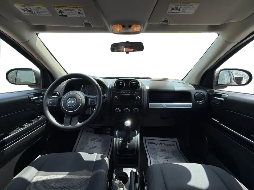 2015 Jeep Compass Sport (1C4NJDBB8FD) with an 2.4L I-4 DOHC engine, located at 401 Woodman Dr, Riverside, OH, 45431, (937) 908-9800, 39.760899, -84.123421 - Weekend plans don't always stay on pavement-and that's exactly where this 2015 Jeep Compass Sport shines. Whether you're mapping out a family day at Riverscape MetroPark, heading to Wright-Patterson AFB for work, or taking a quick escape to the trails and backroads outside Riverside, this compact SU - Photo#20