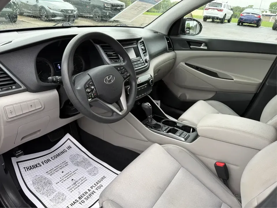 2018 Hyundai Tucson SE (KM8J2CA41JU) with an Nu 2L I-4 gasoline direct injection engine, 6A transmission, located at 4508 South Dixie Dr, Moraine, OH, 45439, (937) 908-9800, 39.689976, -84.218452 - Pack up the kids for a day at Carillon Historical Park, load camping gear for a weekend at Germantown MetroPark, or settle into a comfortable long commute down I-75-this 2018 Hyundai Tucson SE is the kind of compact SUV that fits real life in the Miami Valley. With its versatile SUV body style, conf - Photo#9