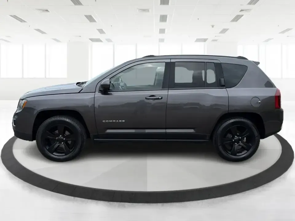 2016 Jeep Compass High Altitude Edition (1C4NJDEB2GD) with an 2.4L I-4 DOHC engine, 6A transmission, located at 8750 N County Rd 25A, Piqua, OH, 45356, (937) 908-9800, 40.164391, -84.232513 - Need a compact SUV that can handle Ohio weather, weekday commutes, and spontaneous weekend escapes without feeling bulky? This **2016 Jeep Compass High Altitude Edition 4WD** fits that lifestyle well-easy to park for errands around town, confident on wet back roads, and comfortable for longer drives - Photo#5